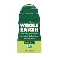 Whole Earth Original bottle beside coffee, offering naturally sugar-free sweetness for your morning cup.