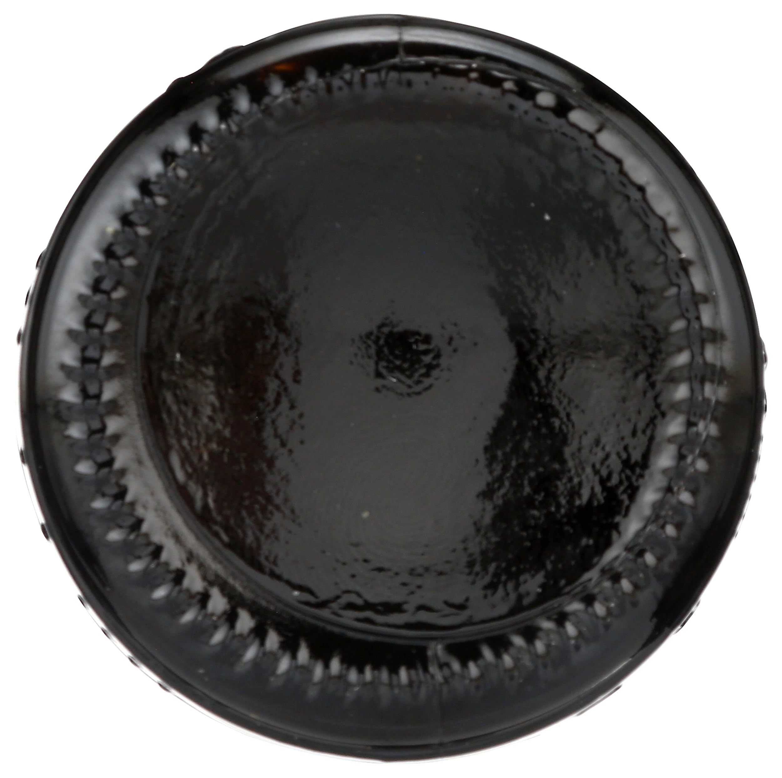 Whole Foods Market Modena balsamic bottle pouring over vegetables hints at drizzling use.