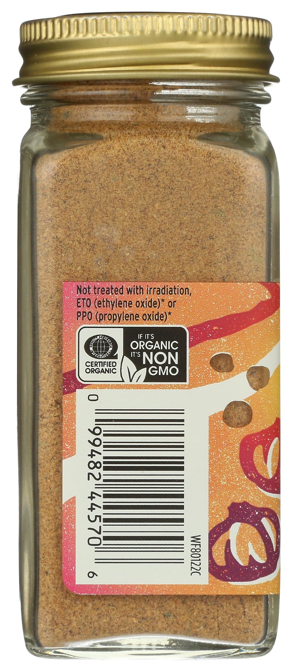 Whole Foods Market Balti Curry spice being sprinkled for bold flavor boost.