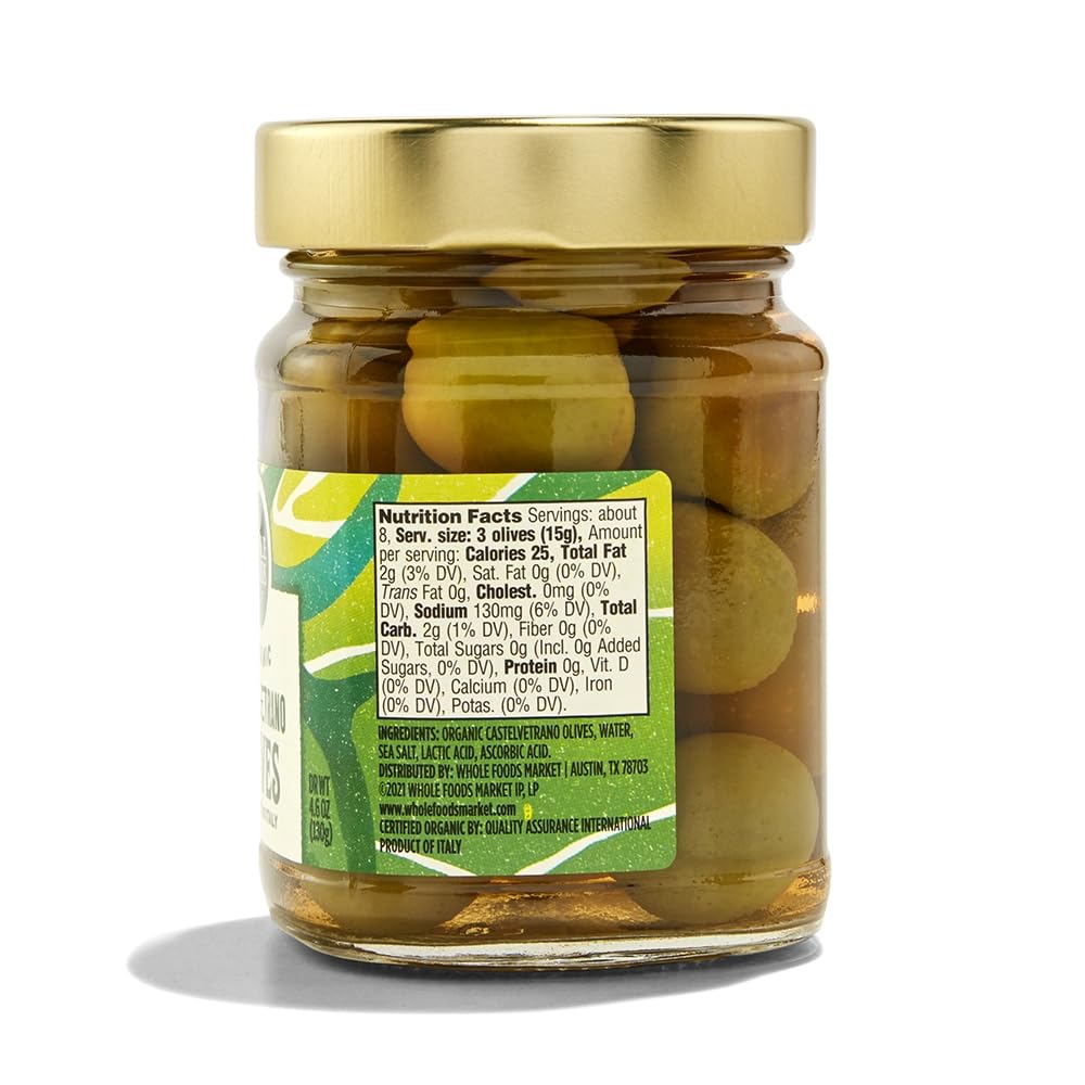 Olives packed in oil from Whole Foods Market, highlighting moisture and flavor preservation.