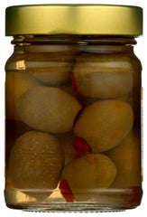 Whole Foods Market closeup of a stuffed olive showing vibrant pepper filling.