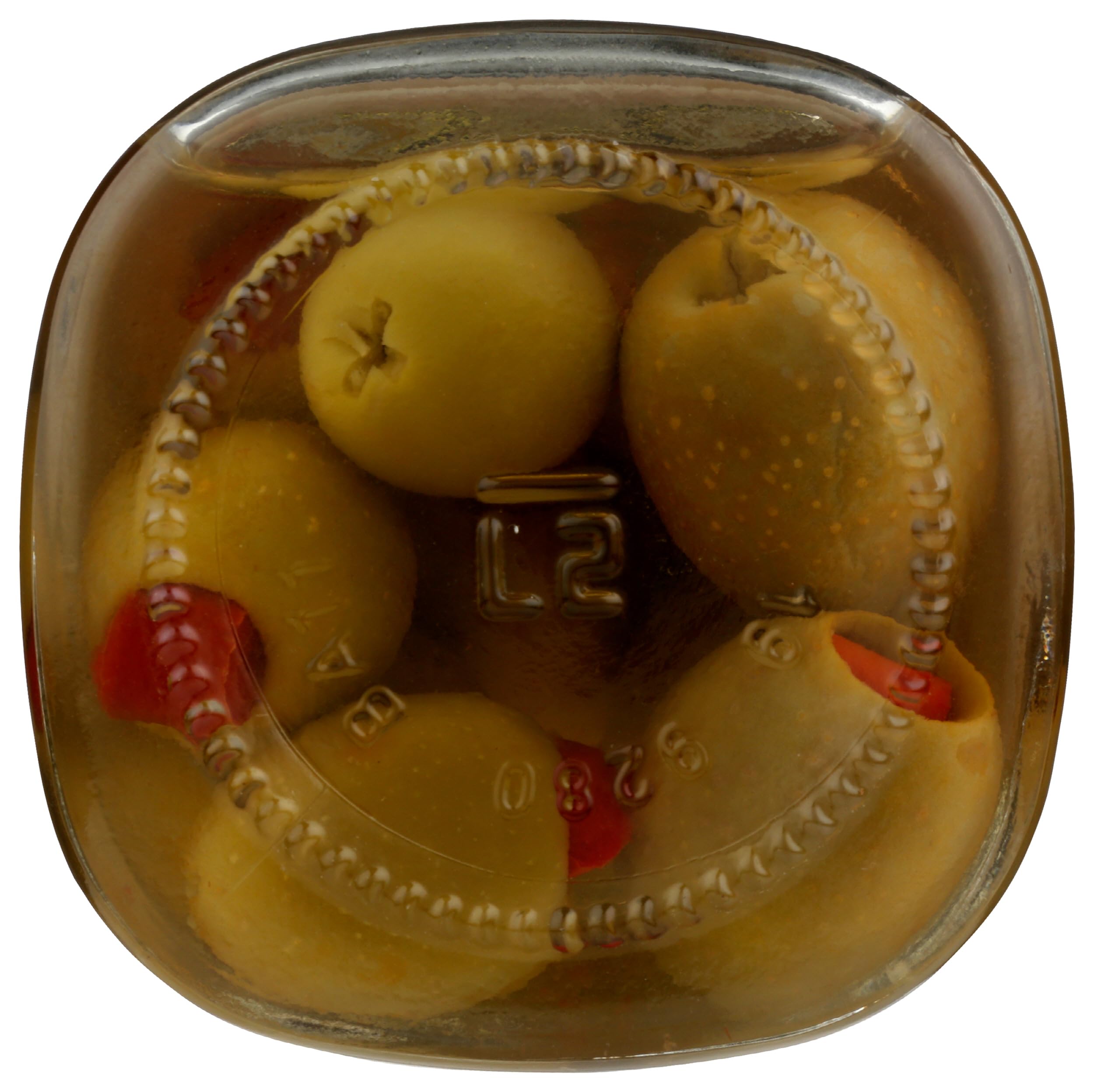 Whole Foods Market jar shot highlights red pepper stuffed olives for pantry snacking.