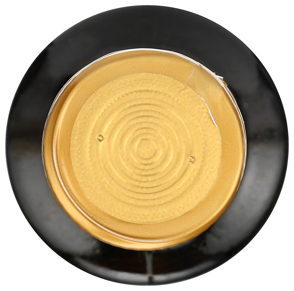 Whole Foods Market modena balsamic label closeup highlights authentic aging notes.