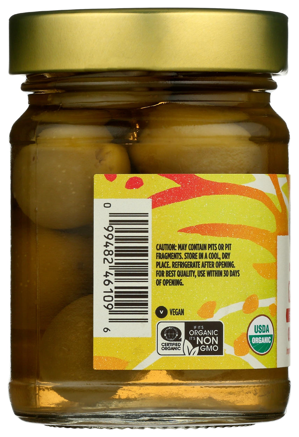 Whole Foods Market garlic stuffed olives beside a cocktail, suggesting savory pairing options.
