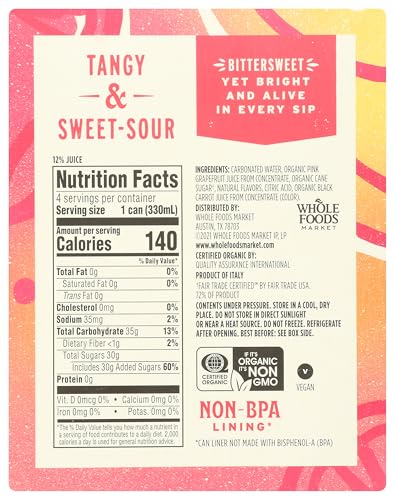 Whole Foods Market Organic Pink Grapefruit Italian Soda bottle label closeup shows natural ingredients.
