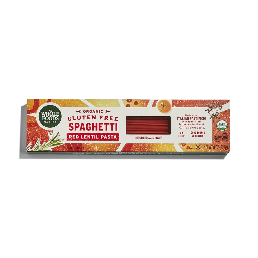 Whole Foods Market Organic Red Lentil Spaghetti 8 oz package on counter, gluten-free and protein-rich.