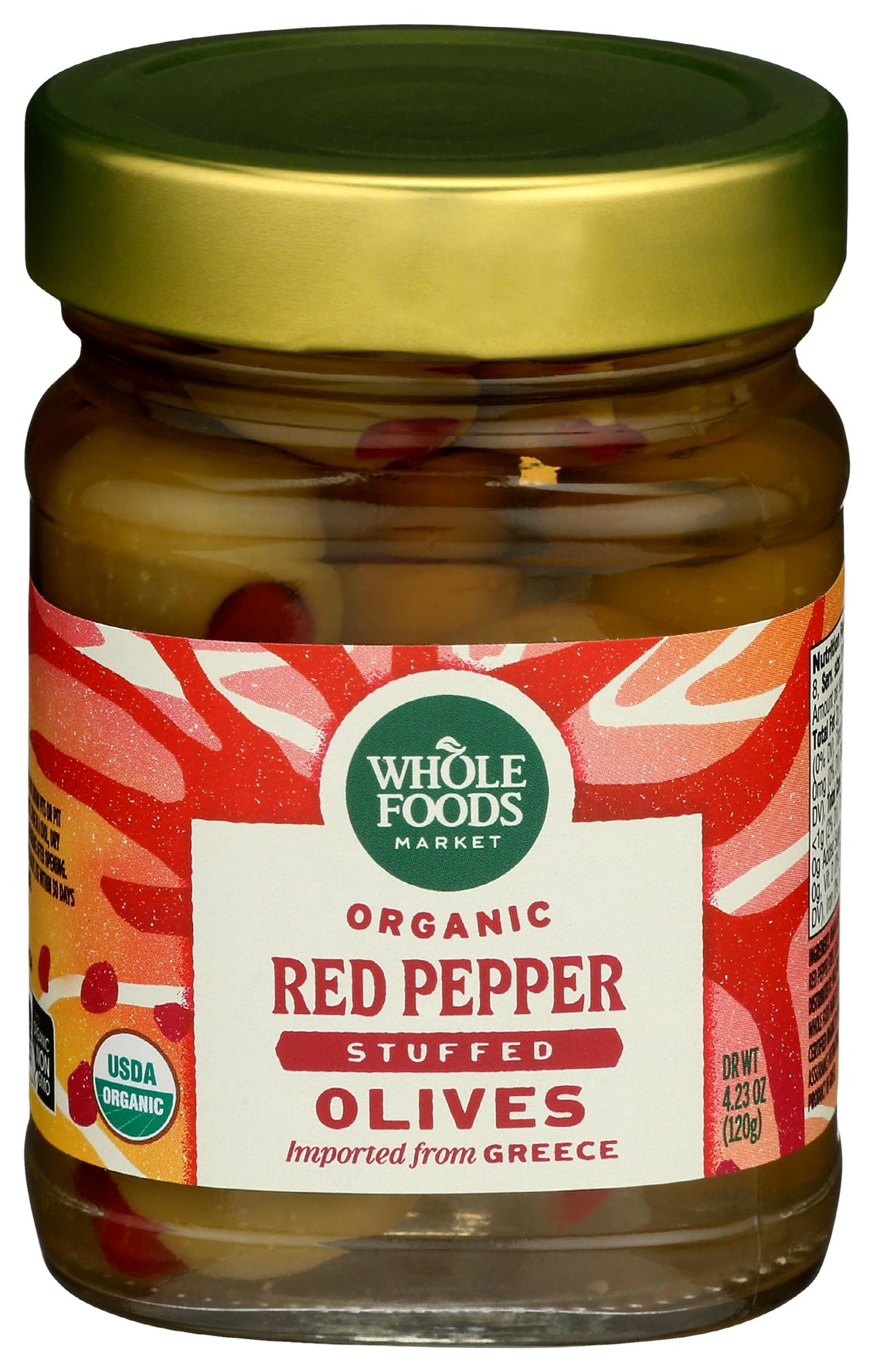 Whole Foods Market organic red pepper stuffed olives in a pack, ideal for antipasti.