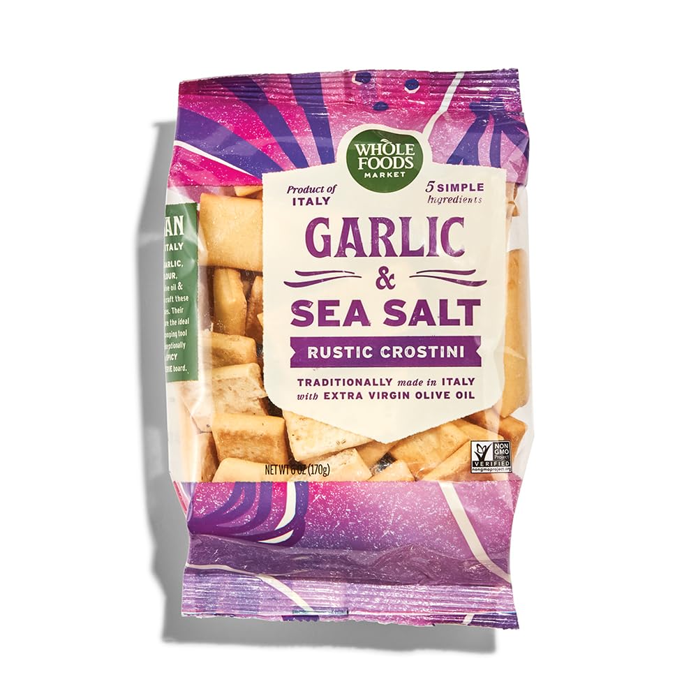 Whole Foods Market Rustic Italian Crackers Garlic & Sea Salt with crisp texture, ideal for cheese pairings.