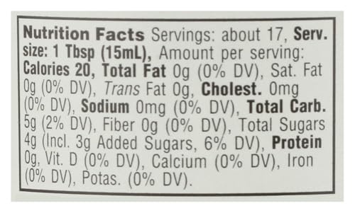 Whole Foods Market fig condiment on pantry display, ready to drizzle over veggies.