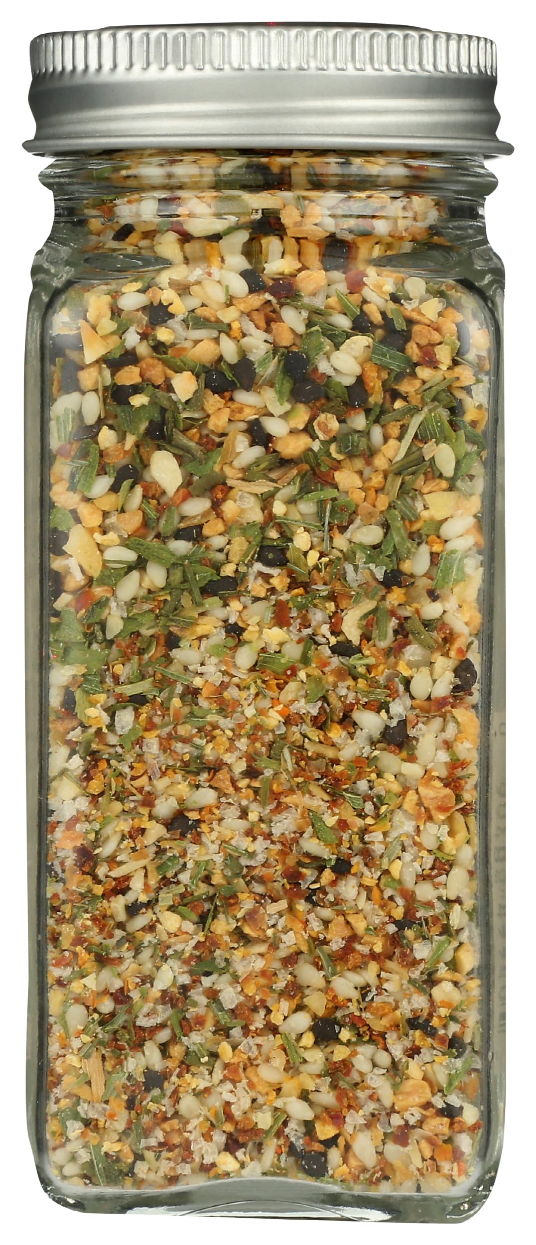 Pouring Whole Foods Market Spicy Sesame Garlic Crunch adds heat and aroma to a dish