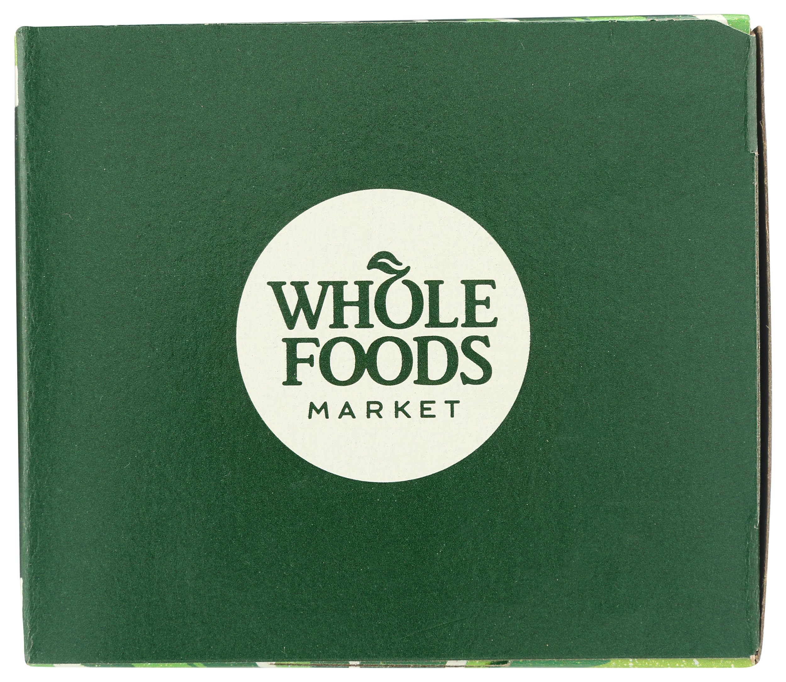 Whole Foods Market tea bags sit neatly, individually wrapped for ongoing freshness.