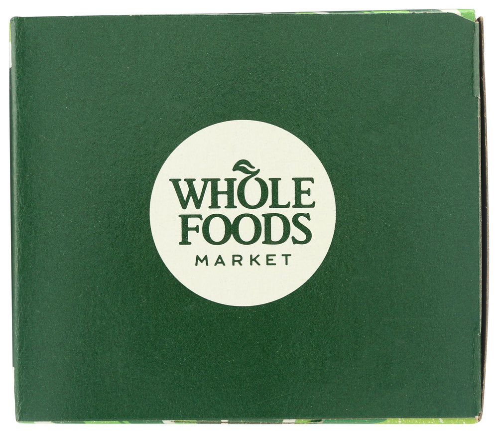 Whole Foods Market tea bags sit neatly, individually wrapped for ongoing freshness.