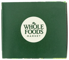 Whole Foods Market tea bags sit neatly, individually wrapped for ongoing freshness.