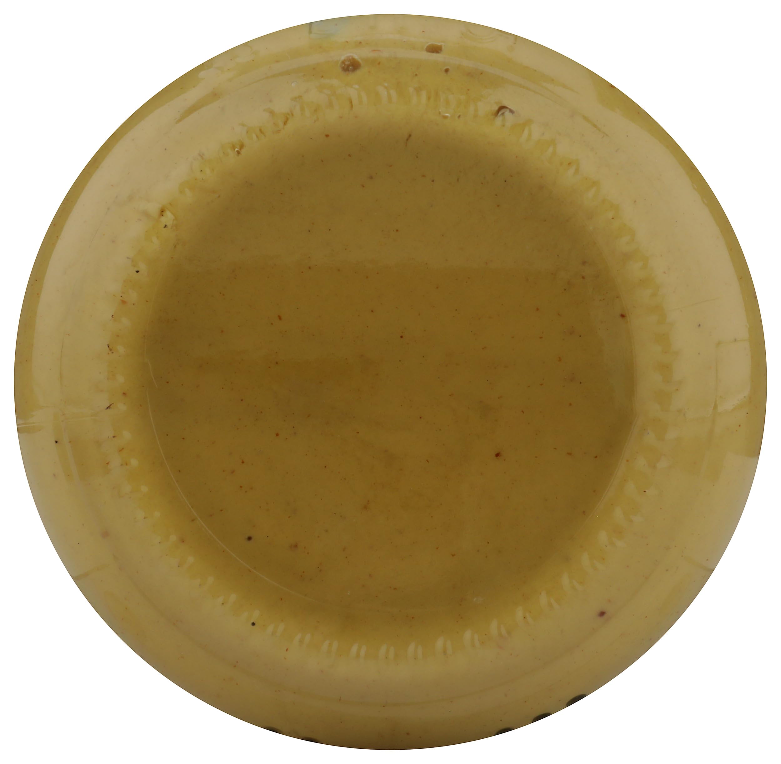 Whole Foods Market traditional Dijon mustard closeup emphasizing texture and color.