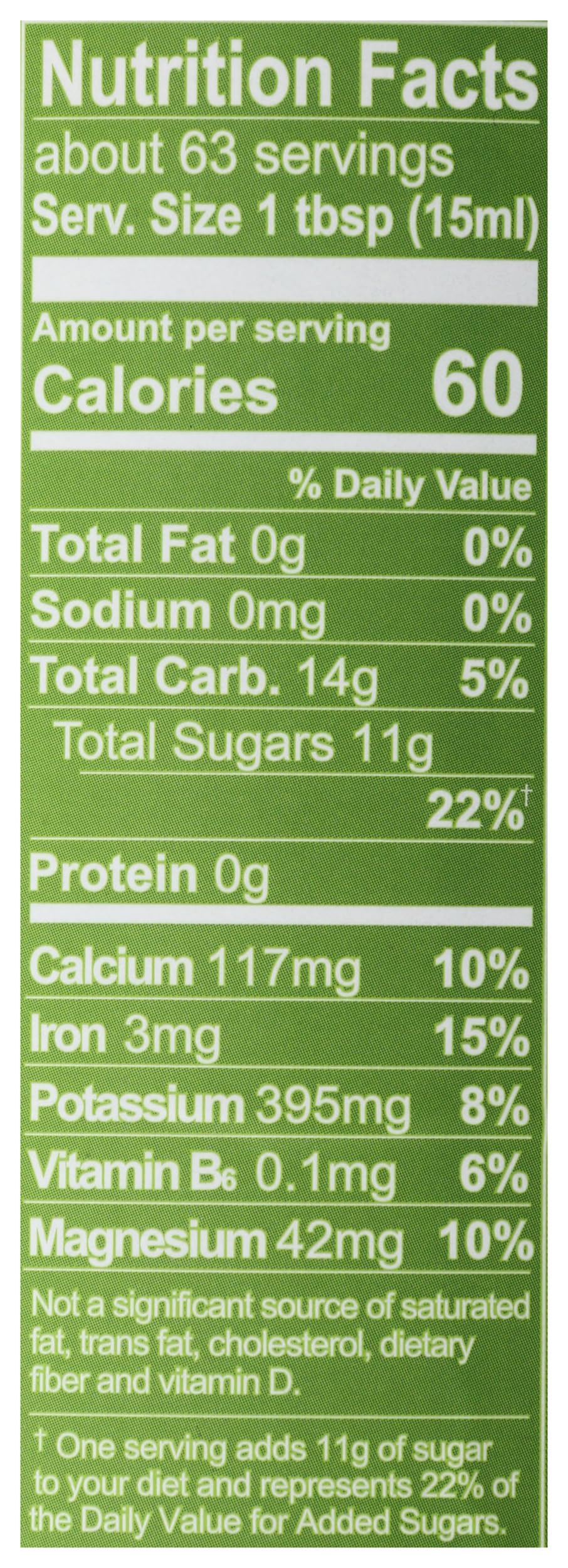 Close-up of Wholesome Molasses label showing organic and fair trade certifications.