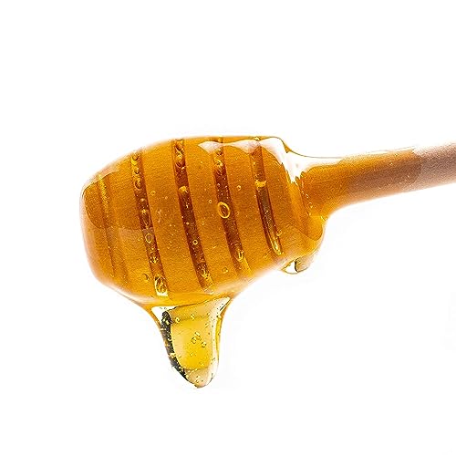 Wholesome Yum cinnamon honey substitute bottle beside sauces and dressings