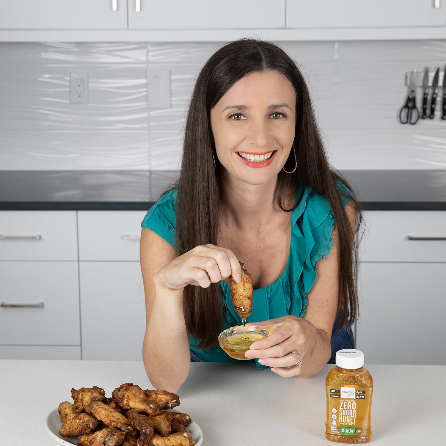 Wholesome Yum jalapeno honey substitute kitchen scene shows keto-friendly topping.