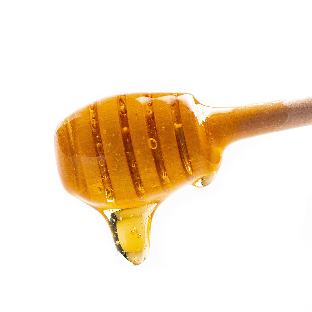 Fiber content note on nutrition panel appears on Wholesome Yum honey substitute box.