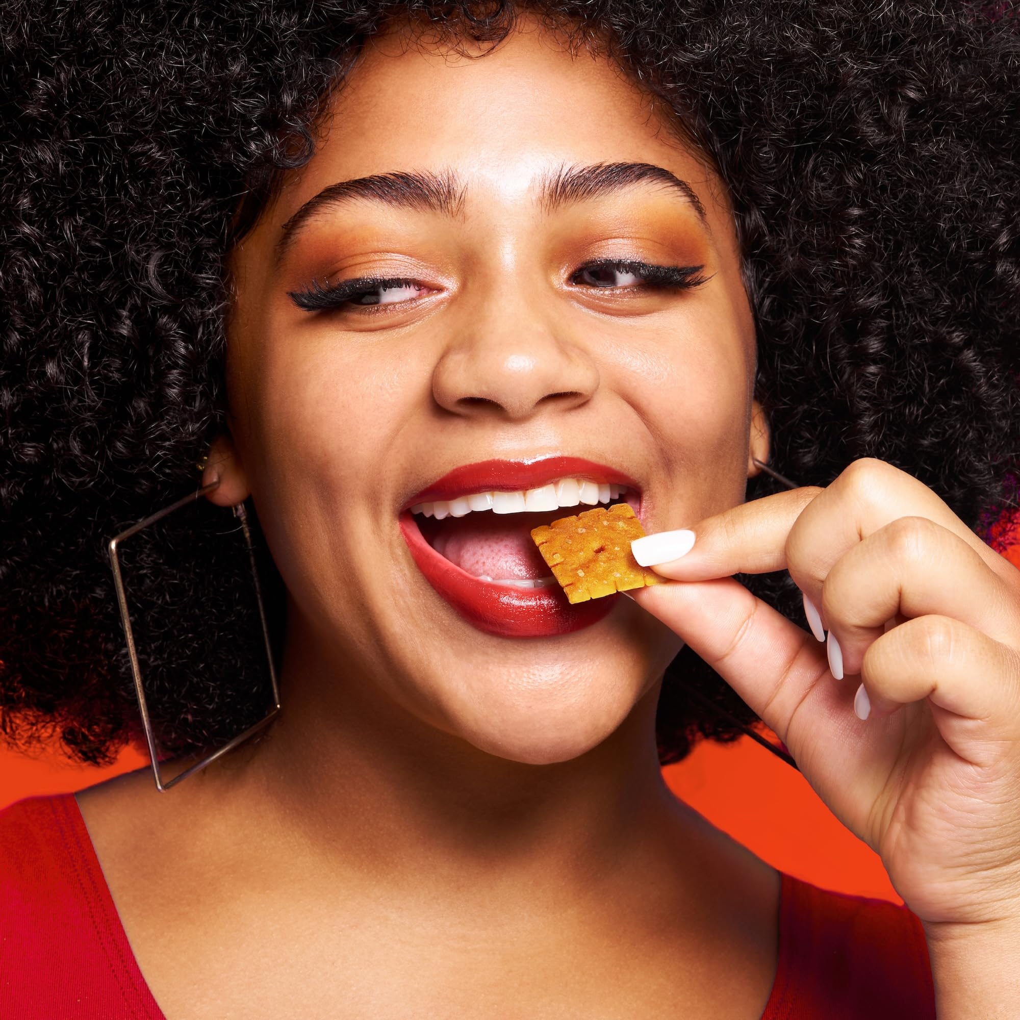 WHY? SNACKS crackers arranged on a cheese board suggest pairing ideas.