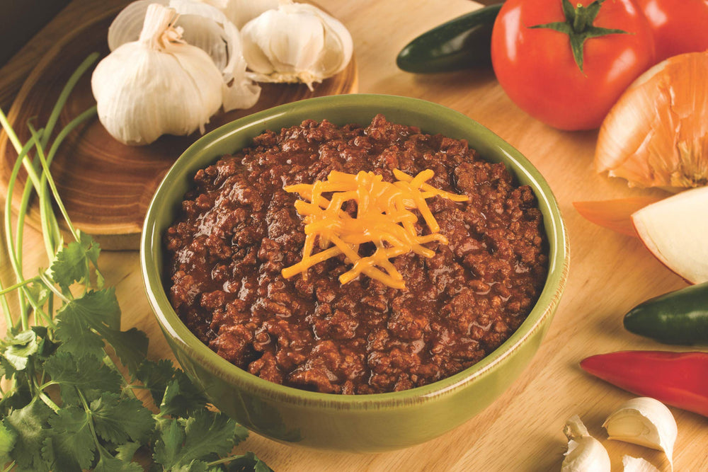 Wick Fowler's 2 Alarm Chili Kit corn masa flour pack adds authentic texture.
