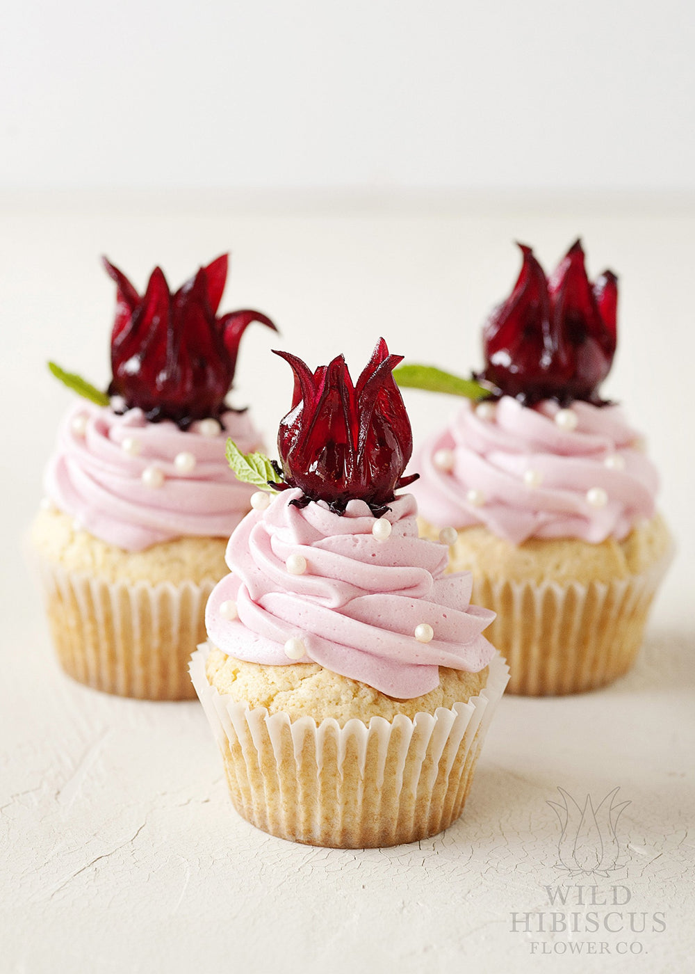 Wild Hibiscus flowers as dessert garnish for bright color and aroma.
