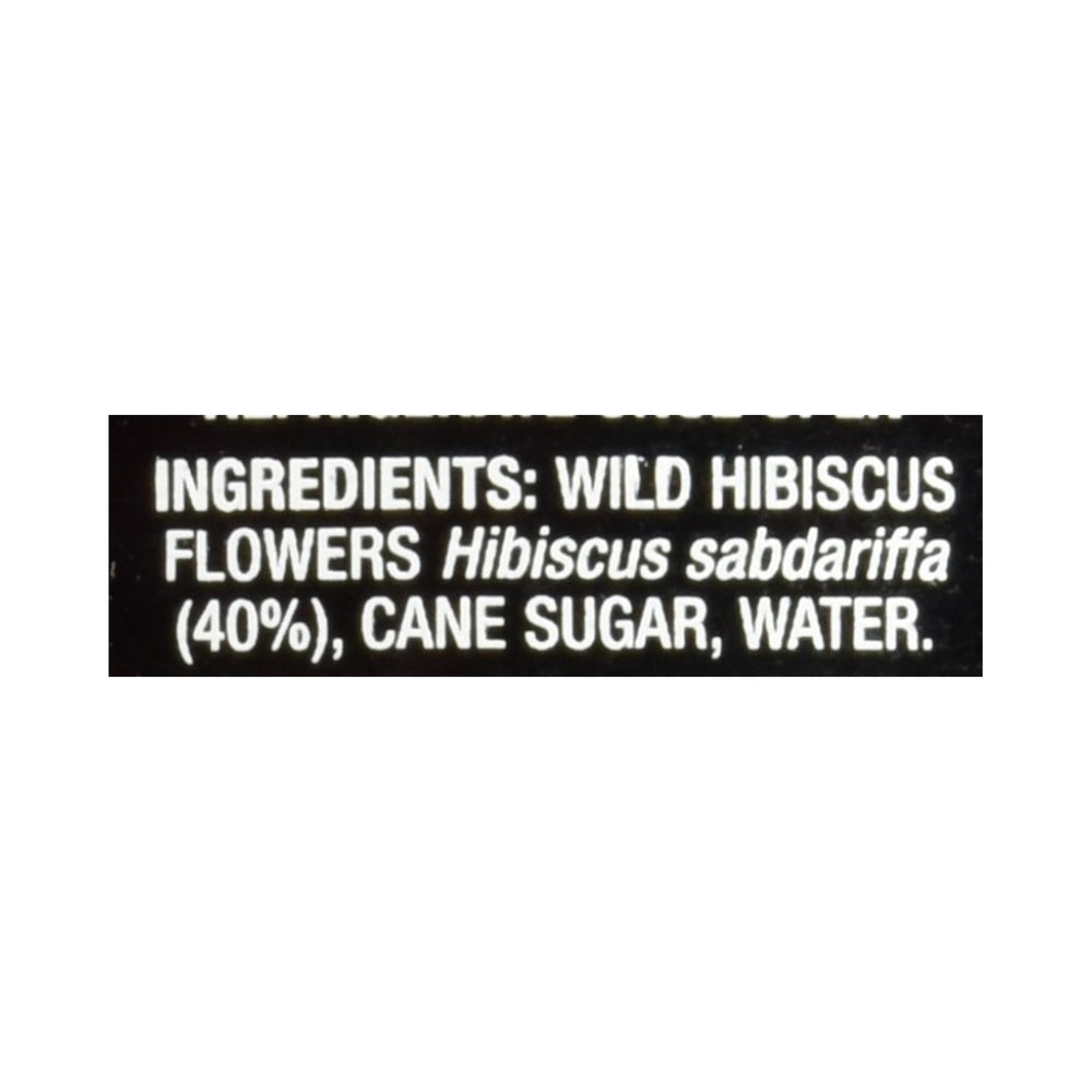 Wild Hibiscus flowers in champagne glass release color and flavor.