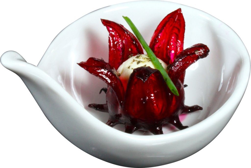 Wild Hibiscus Flowers in champagne glass for elegant bubbly garnish.
