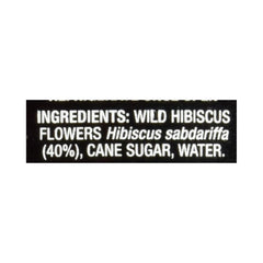 Wild Hibiscus flowers in champagne glass release color and flavor.