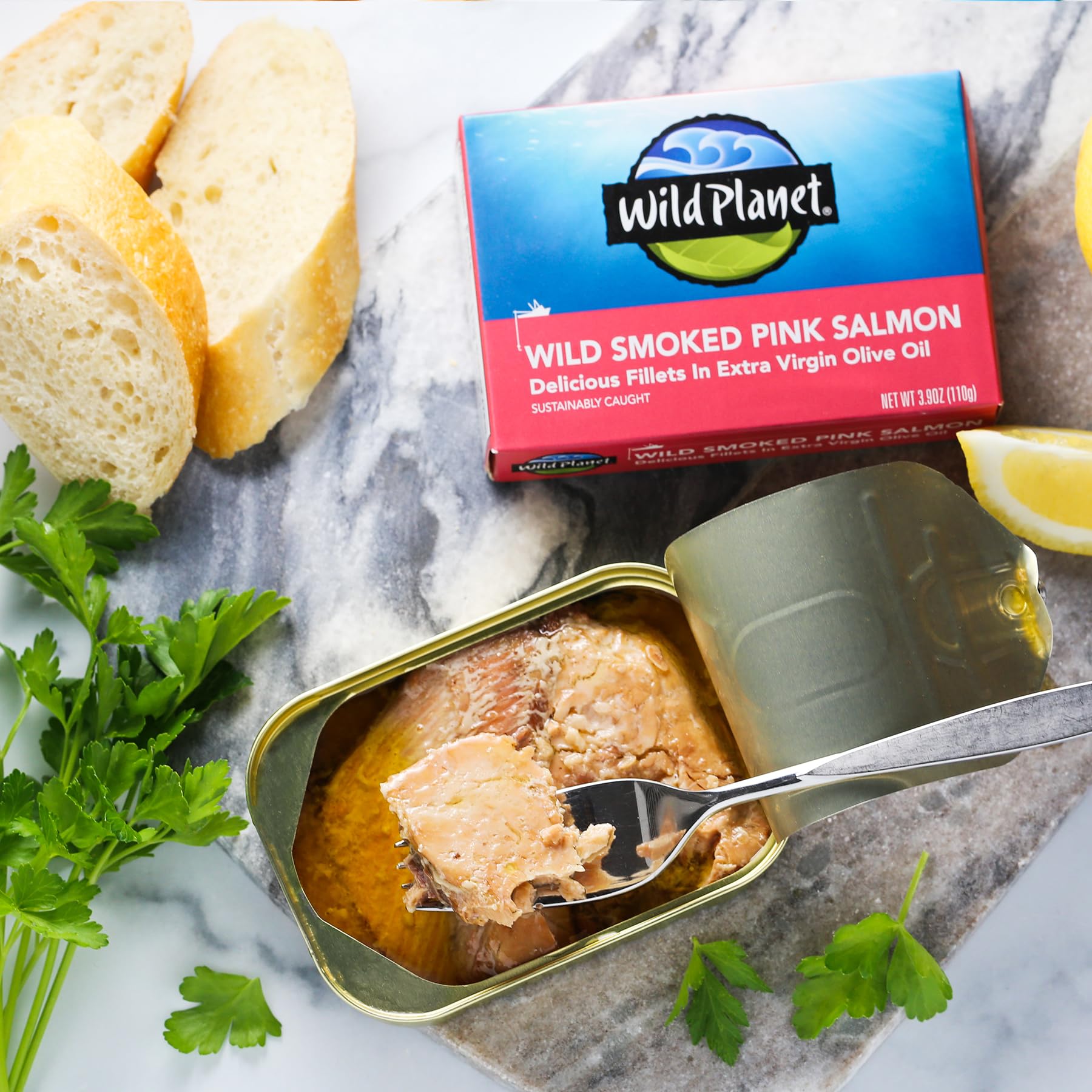 12-pack Wild Planet salmon cans, ocean-friendly protein source.