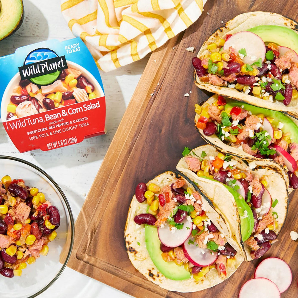 Wild Planet Salad Tuna Bean Corn plated with greens inspires quick, balanced meals.