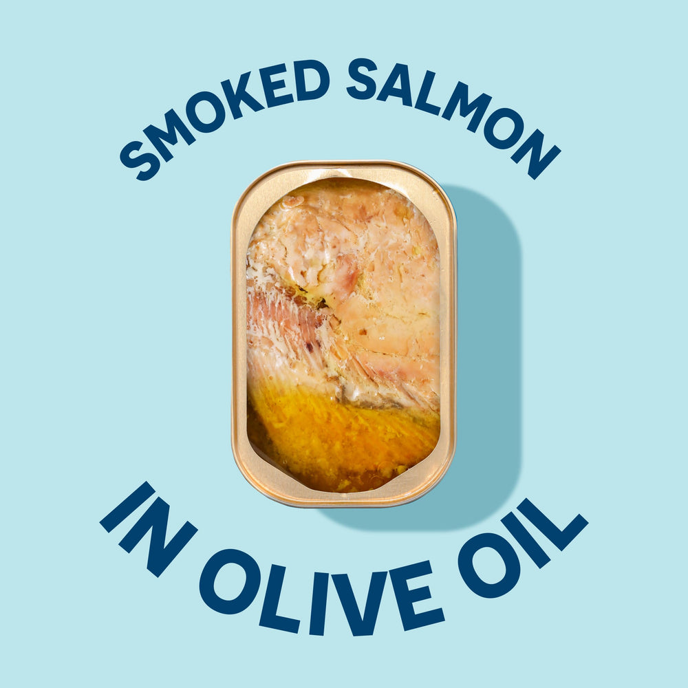 Wild Planet salmon in olive oil on plate, suggesting premium flavor for easy dinners.