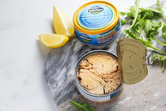 Close-up of tuna in olive oil showing rich color.