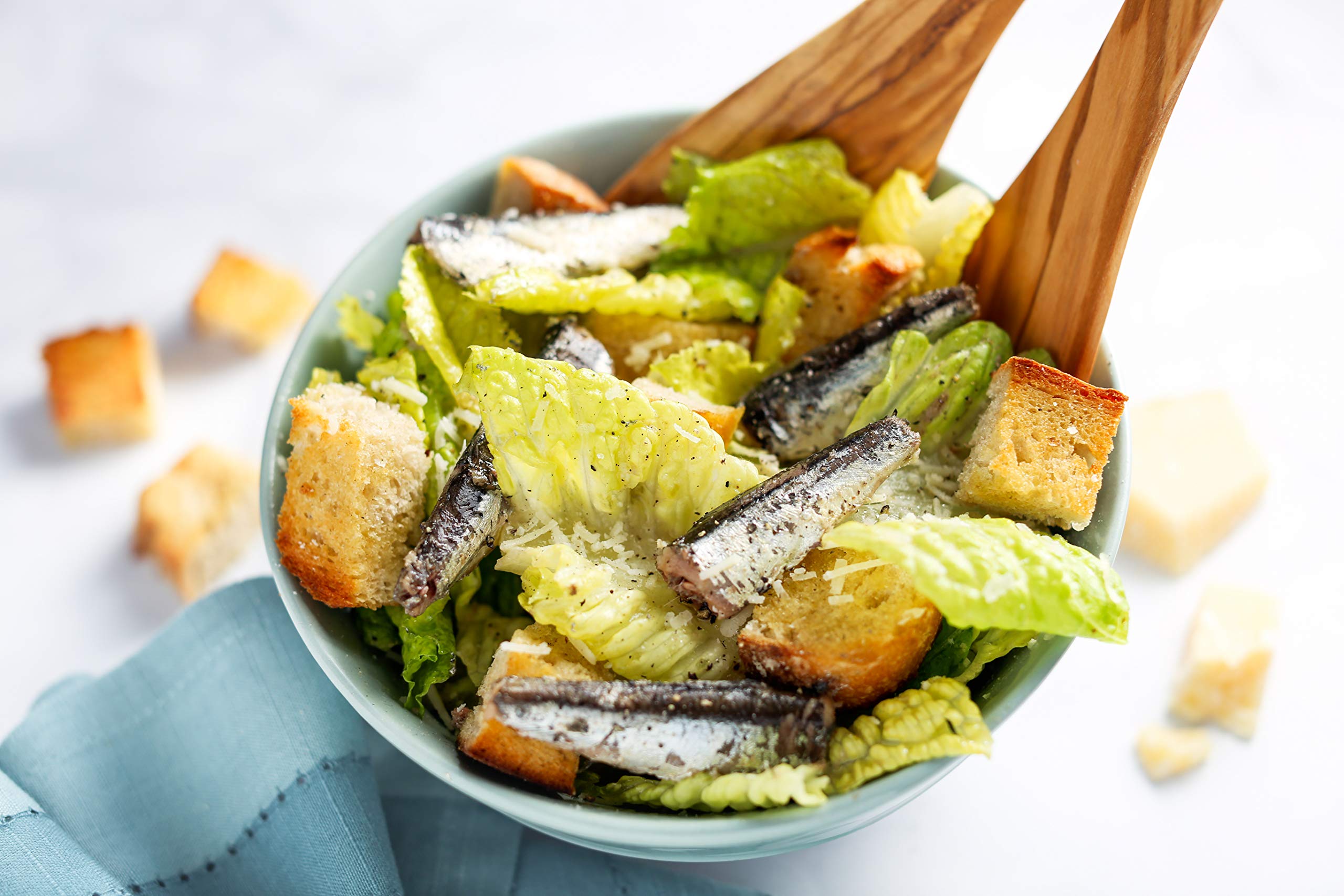 Wild Planet Wild White Anchovies plated on a salad