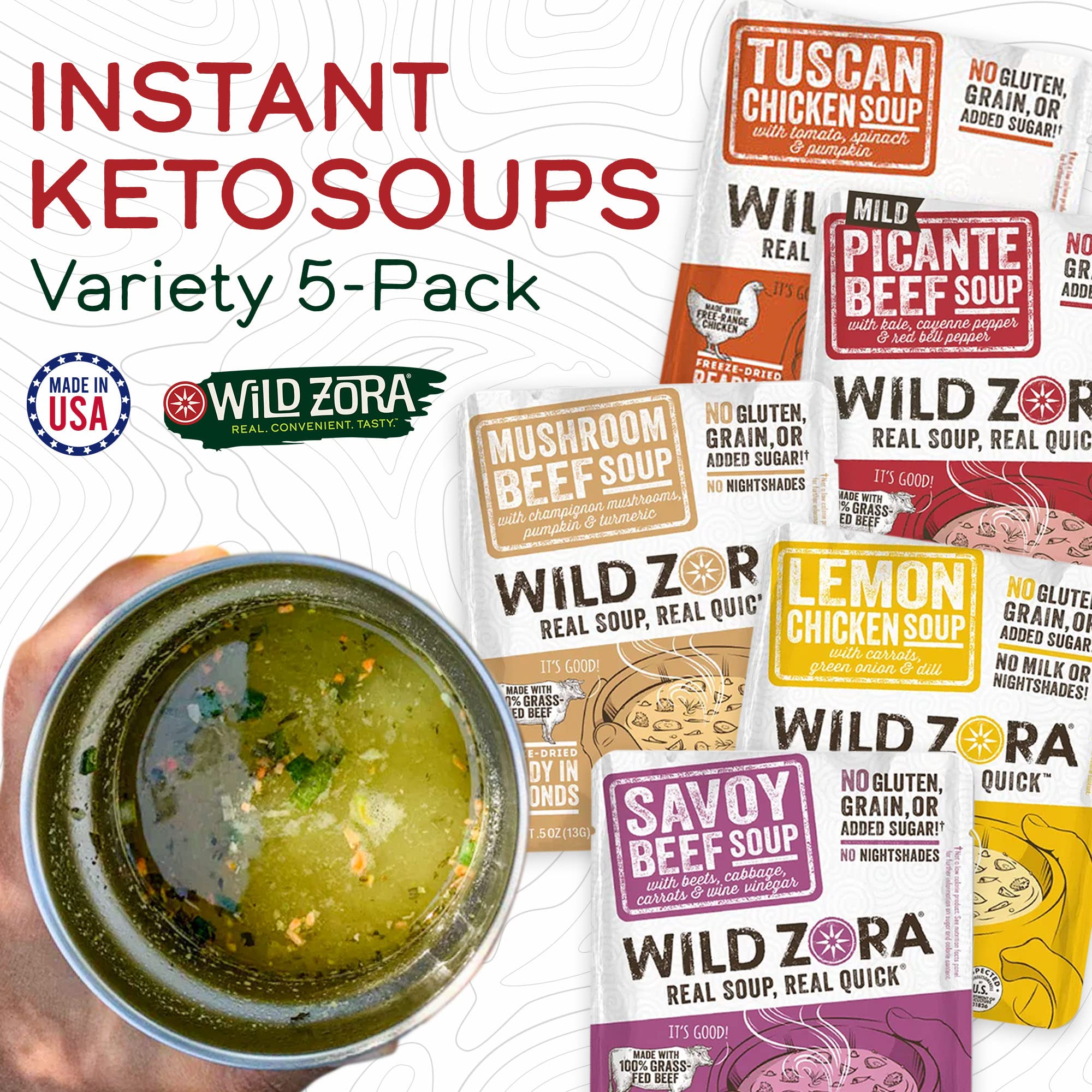 Wild Zora Lemon Chicken Soup cup highlights bright citrus and vegetables.