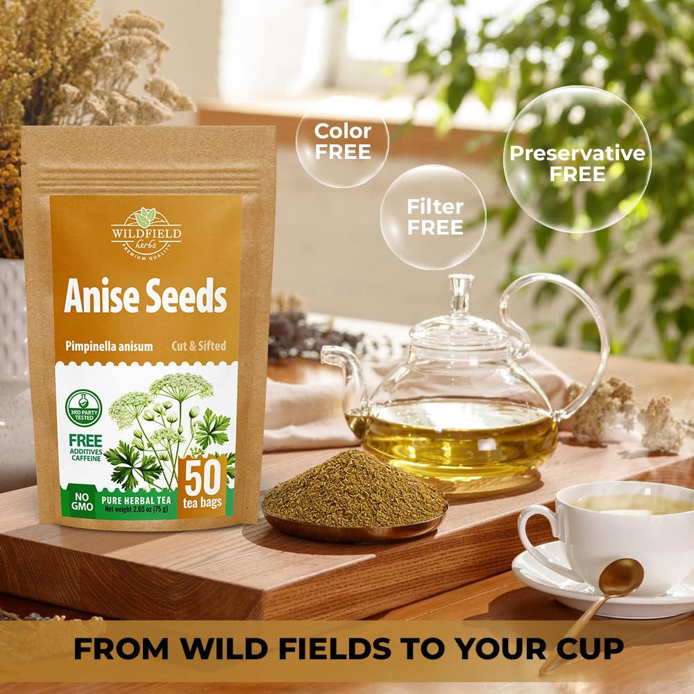Wildfield Herbs tea bag steeping in cup showing warm aromatic brew.