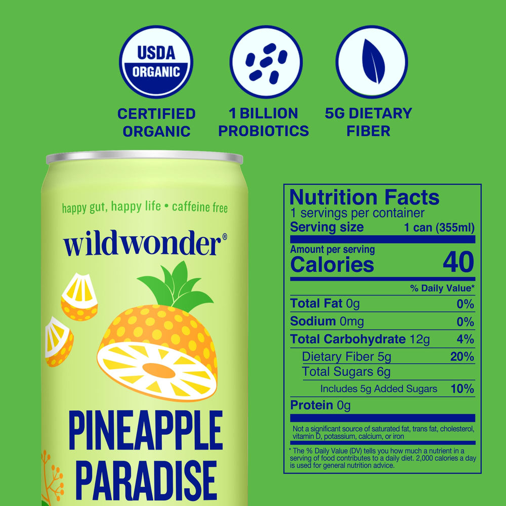 Wildwonder Pineapple Paradise can being poured into a glass with lively bubbles.