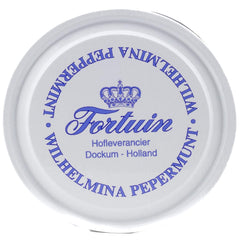 Opened tin reveals mints ready for sharing in any setting.
