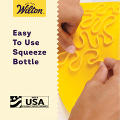 Wilton Dab-N-Hold adhesive on fondant for layering details.