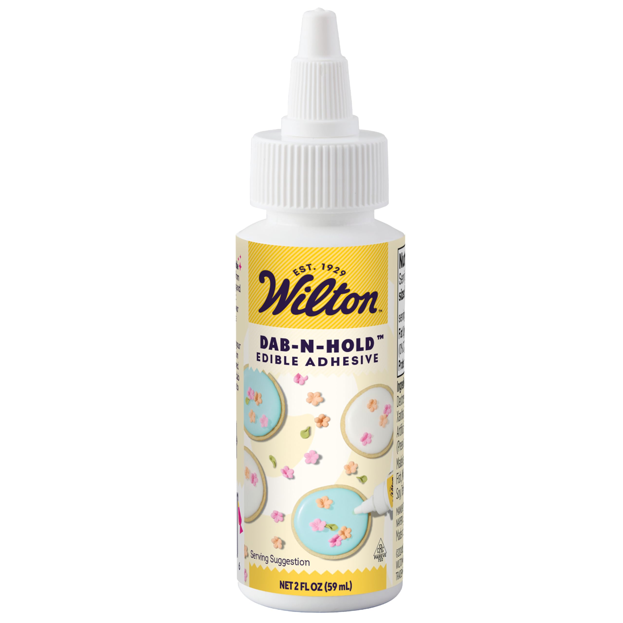 Wilton Dab-N-Hold bottle close-up showing clear edible adhesive for secure fondant.