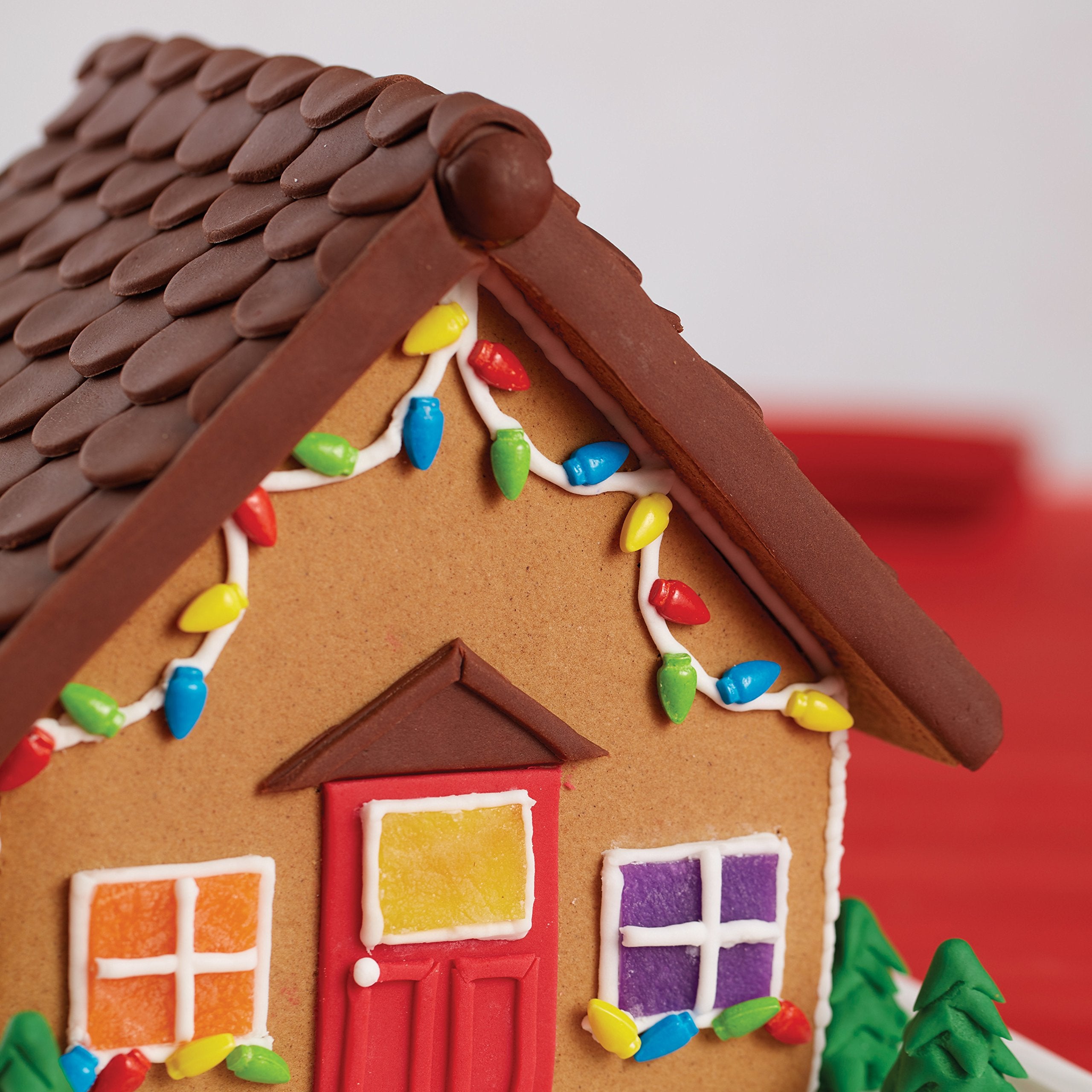 Wilton Decorator Preferred Chocolate Fondant animal shapes for playful cake toppers.
