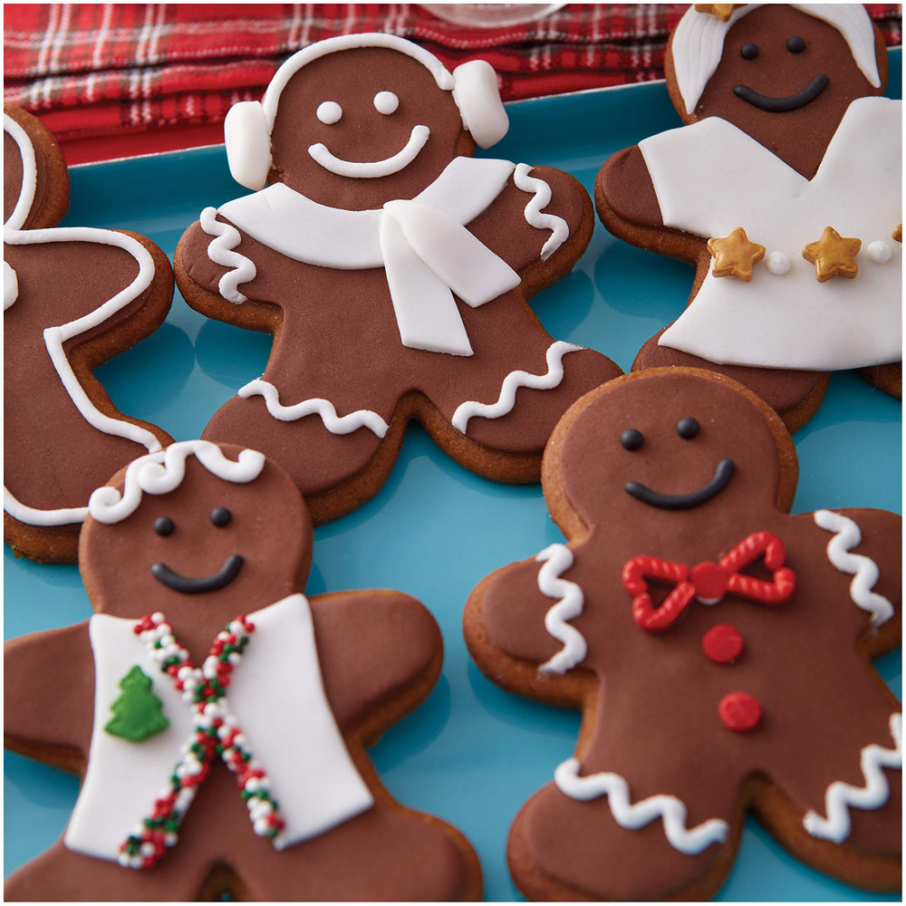Wilton Decorator Preferred Chocolate Fondant cut-outs create crisp shapes for decorations.