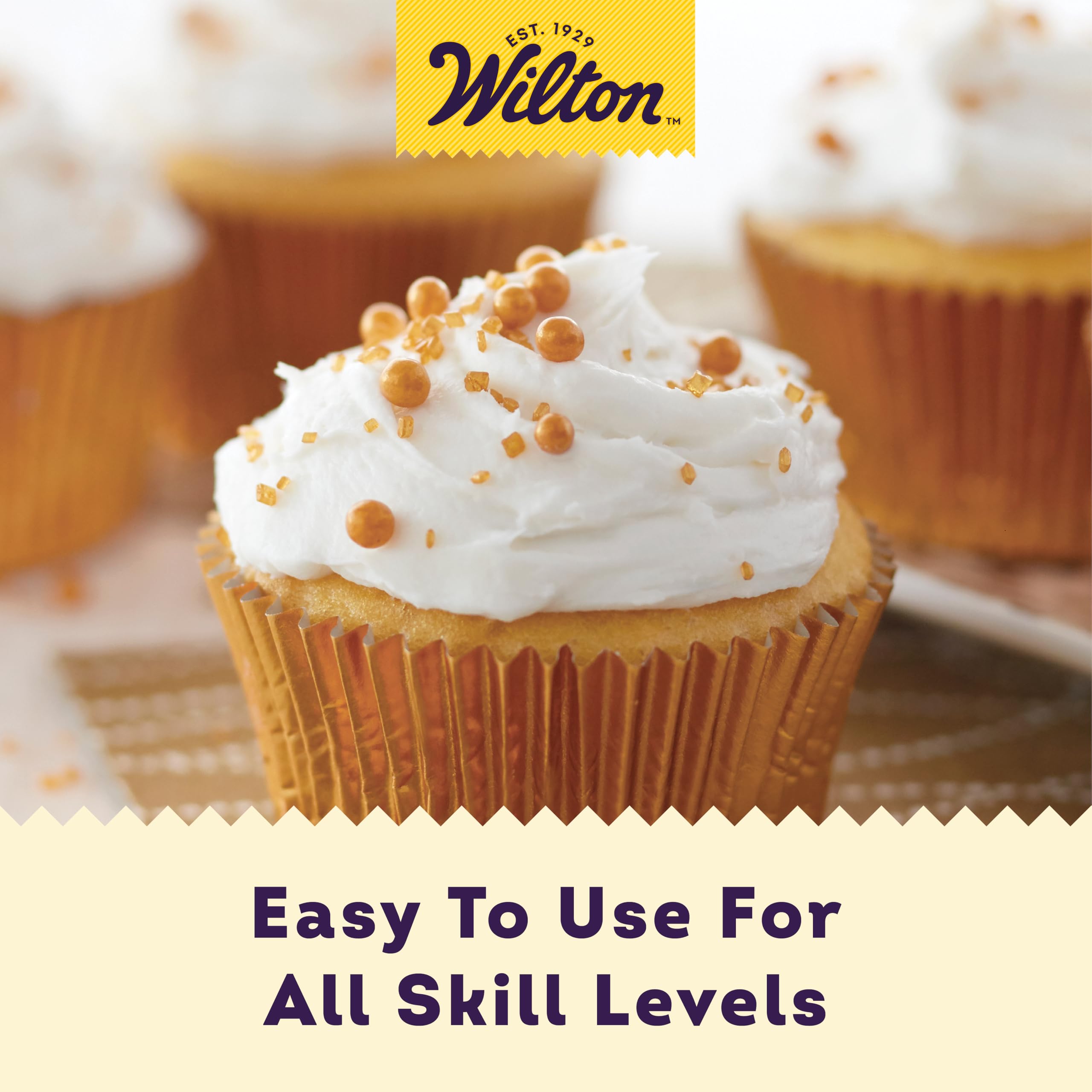 Wilton Gold Pearlized Sugar Sprinkles atop a cake provide shimmering elegance