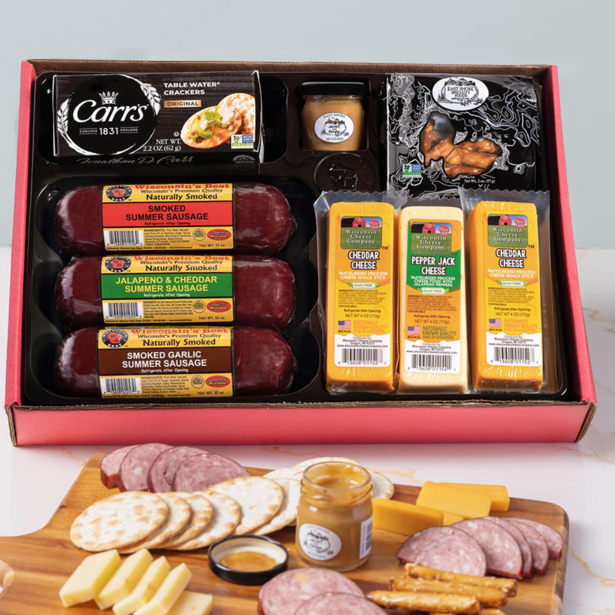 Wisconsin Cheese Company smoked sausage on a party board, perfect for sharing.