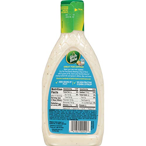 Dipping veggies into Wish-Bone Fat Free Ranch Dressing