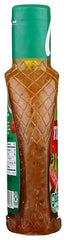 Wish-Bone Italian dressing beside marinated chicken, suggests versatile use