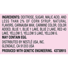 Wonka Rainbow Nerds sprinkled on cupcake adding color and crunchy topping