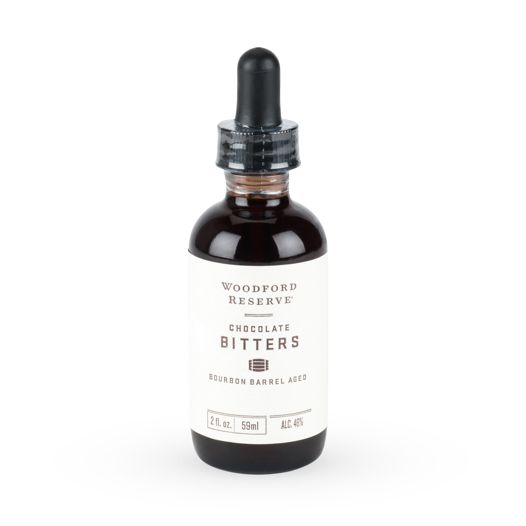 Woodford Reserve Bourbon Barrel Aged Chocolate Bitters bottle pour enhances cocktails with chocolate notes.