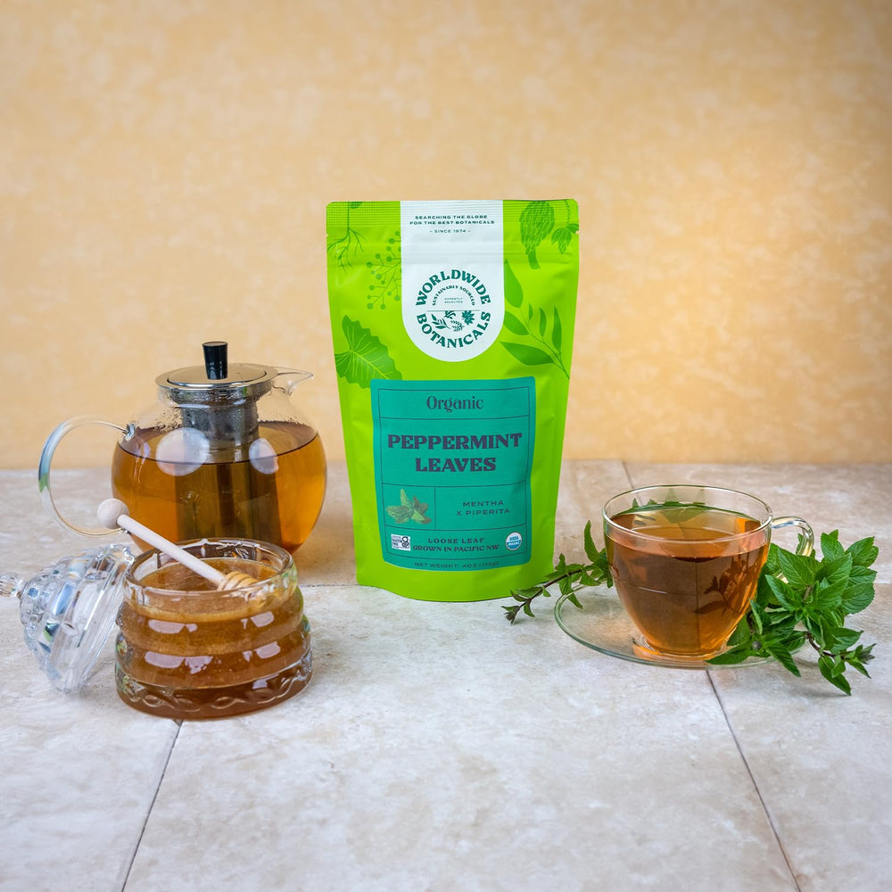 Worldwide Botanicals peppermint tea iced serving in a glass.