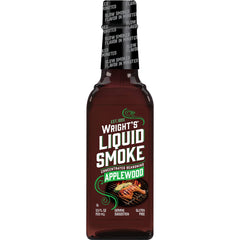 Wright's Liquid Smoke Applewood bottle enhances marinades with rich smoky aroma.