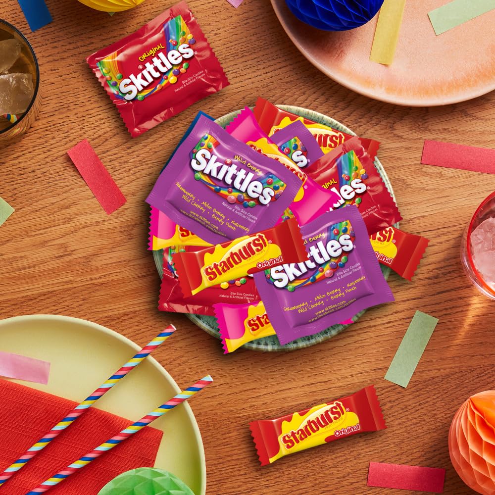 Wrigley's party-size bulk bag on counter with colorful bowls for gatherings.